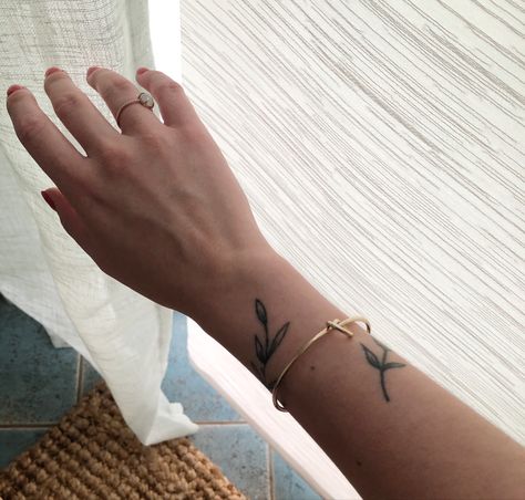 Delicate Flower Wrist Tattoo, Olive Wrist Tattoo, Olive Branch Tattoo On Wrist, Olive Branch Wrist Wrap Tattoo, Olive Branch Arm Tattoo, Leaves Tattoo Wrist, Branch Tattoo Wrist, Wrist Leaf Tattoo, Leaf Tattoo Wrist