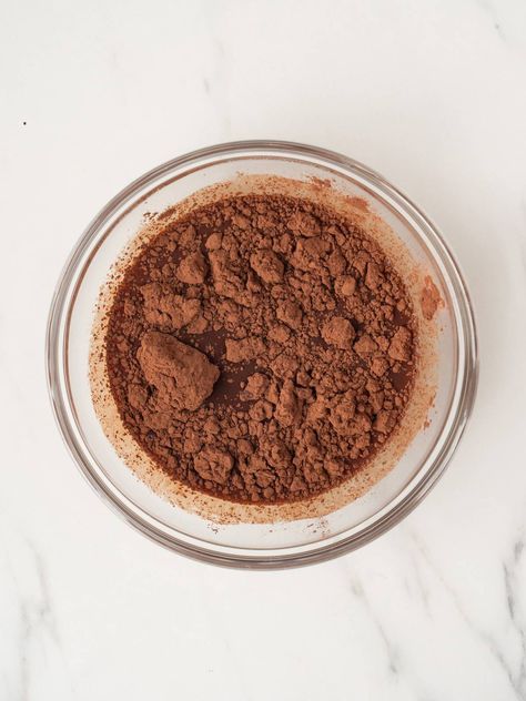 A glass mixing bowl with cocoa powder, espresso and vanilla. Frozen Tiramisu, How To Make Tiramisu, Easy Tiramisu, Easy Tiramisu Recipe, Lady Finger Cookies, Italian Tiramisu, Whats Gaby Cooking, Tiramisu Recipe, Easy To Make Desserts