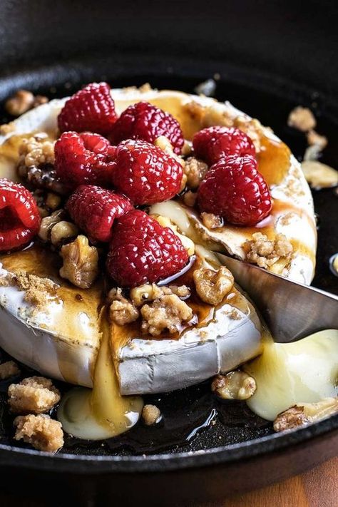 Raspberry and Walnut Baked Brie! Warm baked brie topped with brown sugar, candied walnuts, and raspberries soaked in a honey balsamic sauce. | HomemadeHooplah.com Valentines Baked Brie, Handheld Food For A Crowd, Lunch Party Recipes, Brie Appetizers, Homemade Hooplah, Balsamic Sauce, Brie Recipes, Honey Balsamic, Baked Brie