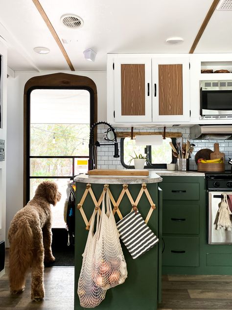 Camper Renovation DIY you must see! #camperrenovation #camperreno #rvrenovation #bohorvreno Dark Green Camper Cabinets, Camper Remodel Hacks, Funky Camper Remodel, Camper Murphy Bed Diy, Lake House Camper Decor, Rv Decorating Ideas Green, Camper Interior Hacks, Camper Renovation Living Room, Hygge Rv Decor