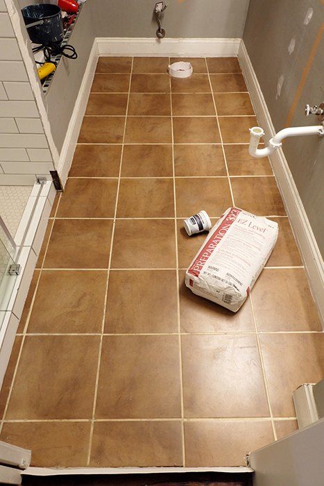 Looking to learn, experiment, and erase a tile floor quick, self-leveling concrete and brass inlays were the weapons of choice. So I finally finished redoing the master shower, right, so ugh, the floor was that much more noticeably awkward and unattractive. It had to go! And go now! But I was so tired of tiling....hm. What to do?I'll try some self-leveling concrete underlayment! Before I get too far into this, I should say that yes, I am aware this product is underlayment and n Cement Floor Bathroom, Concrete Tile Bathroom, Diy Concrete Tiles, Bathroom Concrete Floor, Concrete Floors Diy, Cement Bathroom Floor, Cement Bathroom, Concrete Shower, Cement Tile Floor