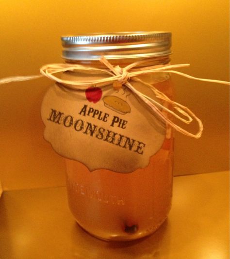 Apple pie moonshine Diy Apple Pie Moonshine, Moonshine Wedding Favors, Apple Pie Moonshine Recipe With Everclear, Apple Pie Moonshine Drinks, Apple Pie Moonshine Recipe, Thirsty Girls, Apple Pie Moonshine, Cabin Wedding, Wedding Favors For Guests