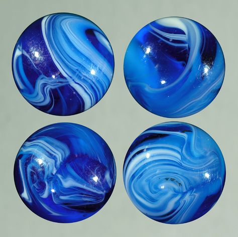 This reminds me of water marbling nail art! I bet #EursoEuro from the #OPIEuroCentrale collection would work great with a sparkly white color to create this look! #AllAboutTheColor Nails Blue Marble, Blue Marbles, Dandelion Paperweight, Kristina Webb, Cobalt Glass, Onyx Marble, Blue Onyx, Nails Blue, Marble Art