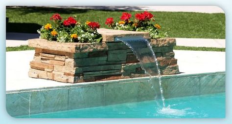 This is fun for just about any pool because it's just a small bench and planter that spouts water. Plus it's easier to accomplish yourself because the planter covers all the waterworks. Pool Waterfall Diy, Pool Waterfall Landscaping, Backyard Pool Cabana, Pool Waterfalls, Waterfall Landscaping, Swimming Pool Waterfall, Diy Waterfall, Pool Water Features, Diy Swimming Pool