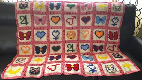 Do you have a Sailor Moon fan in your life? Or would you like to show your personal love for Sailor Moon through crochet? This is the blanket for you! This 54 in x 54 in crochet blanket is made up of squares with Sailor Moon characters and symbols.  This pattern includes full color charts, full written instructions and photos. Sailor Moon Knitting Pattern, Anime Crochet Blanket, Moon Crochet Blanket, Crochet Sailor Moon, Sailor Moon Pattern, Sailor Moon Symbols, Sailor Moon Blanket, Sailor Moon Characters, Sailor Moon Crafts