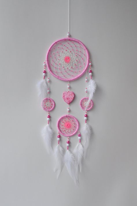 "DREAM CATCHER \"MARSHMALLOW HEART\" Tender dreamcatcher in pink and white. There is a handmade hear bead in the center. For production were used hoops from willow branches, quality semi-woolen yarn, glass pearls, plastic beads, and natural feathers. Wall hanging will be a great gift for girls, girlfriend daughters. Also, it can be good as an element of wedding decor. Dear friend, if you are looking for something similar to this dream catcher, we have the opportunity to customize it (colors, des Hippie Wedding Decorations, Pink Dream Catcher, Hanging Rose, Stuff Toys, Blue Dream Catcher, Beautiful Dream Catchers, Dream Catcher Decor, Dream Catcher Wall Hanging, Black Dream Catcher