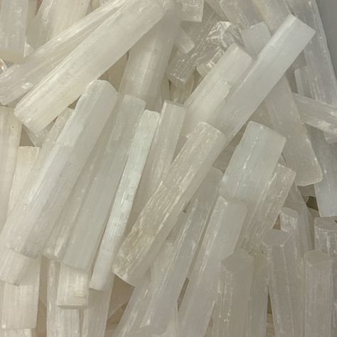 This lot includes 10 lbs of 4-5" natural rough solid Selenite crystal sticks. Known for their cleansing and healing properties, these raw Selenite pieces are perfect for energy work, meditation, or enhancing your home décor.  Selenite is prized for its ability to clear negative energy, promote mental clarity, and create a peaceful environment. These solid, unpolished sticks are ideal for gridding, altar displays, or as tools for chakra balancing. A must-have addition for any crystal collector or Selenite Aesthetic, Peaceful Environment, Selenite Wands, Clear Negative Energy, Selenite Crystal, Chakra Balancing, Energy Work, Mental Clarity, Healing Properties