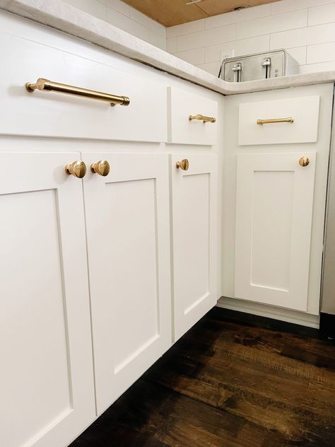 White Cabinets Brass Hardware Kitchen, Brass Kitchen Hardware White Cabinets, White Cabinets Bronze Hardware, Brass Hardware White Cabinets, White Kitchen Cabinets With Brass Hardware, White Cabinets Brass Hardware, Warm White Cabinets, Kitchen Hardware White Cabinets, Polished Chrome Kitchen Faucet