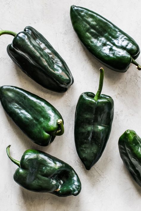 Learn how to make roasted poblano peppers in an oven or over an open flame for use in many delicious recipes! Ready in 15 minutes or less! #poblanos #roastedpoblanos #mexicanrecipes Rellenos Recipe, Ground Beef Breakfast, Poblano Peppers Recipes, Roasted Poblano Peppers, Poblano Pepper, Ancho Chili Powder, Chile Poblano, Ancho Chili, Poblano Peppers