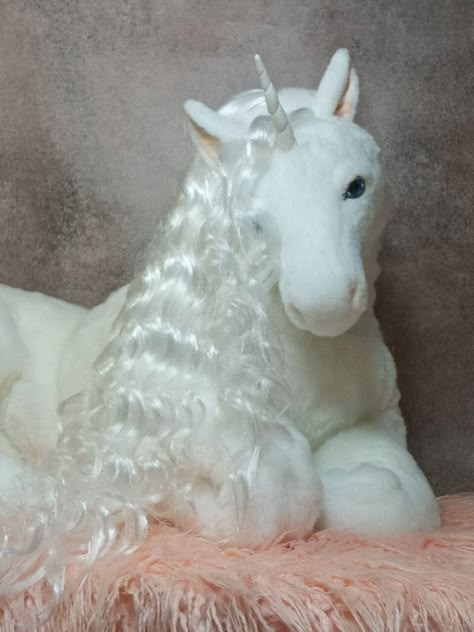 The full height of the unicorn is 72cm. It is sewn from snow-white very soft faux fur. Inside there are Lockline skeleton, sintepon and hollow fiber. Glass eyes are blue with glitter (with the effect of glowing eyes). Ears are reinforced. Hooves and horn are made from self-curing clay. Made in smoke-free home. Requires careful handling for its integrity and preservation. Bed Plushies, Unicorn Core, Animal Figurine Toys, Unicorn Plushies, I Believe In Unicorns, Soft Sculpture Art, Fantasy Unicorn, Soft Kidcore, Exotic Pet