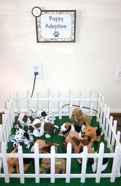 This Puppy AND Kitty display would be cute to set up in the lobby of an animal shelter to make a few extra bucks. Buy the animal toys at the Dollar Store (or order them online from a $tore by the case) Make the display with indoor/outdoor grass carpet, even a fake grass doormat. Line it with cheap flower garden fencing. Charge a reasonable price (after all it's about kids who love animals) and you want them to sell to make a little extra money, maybe use the money to help a special paws cause! Dogs Birthday Party, Dogs Birthday, Adoption Papers, Puppy Birthday Parties, Adoption Party, Paw Patrol Birthday Party, Puppy Birthday, Dog Birthday Party, Fiesta Baby Shower