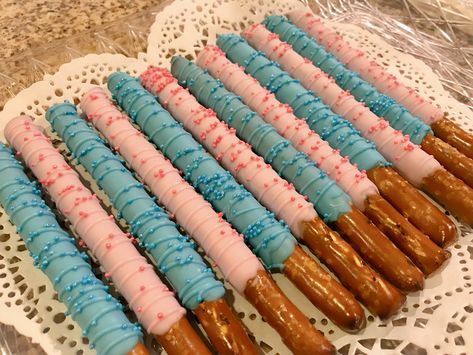 Gender Reveal Ideas Snack Table, Snack Table For Gender Reveal, Chocolate Covered Pretzel Rods Gender Reveal, Gender Reveal Casual Outfit, Rice Krispie Gender Reveal Treats, Pretzel Gender Reveal, Sweets For Gender Reveal, Gender Reveal Pretzel Sticks, Gender Reveal Dipped Strawberries