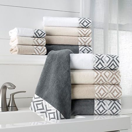 The Avanti Harlow bath towel features offset rows of concentric diamonds intricately embroidered on a 100% polyester cloth. The cotton towel is sheared for a silky, smooth, shimmering ground, the perfect complement to this contemporary design. Towel measures 27" x 50". Included: 1 27x50 Inch Bath Towel(s)Measurements: 50 Length/Inches, 27 Width/InchesBase Material: 100% CottonCare: Machine Wash, Tumble DryDecor Styles: TraditionalFabric Weight: Midweight (450-599 Gsm)Material: WovenTowel Type: B White Hand Towels, Fingertip Towels, Cotton Hand Towels, Towel Collection, Towel Sizes, White Towels, Linen Towels, Guest Towels, Bath Towel Sets