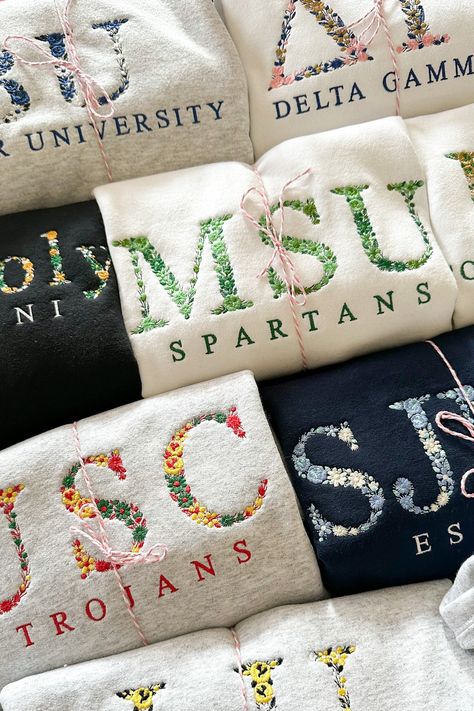 Picture FeaturesPicture #11. MSU Spartans - White Crewneck / Thread Colors: Emerald Green, Moss Green, Mint Green2. USC Trojans - Ash Crewneck / Thread Colors: Red, Emerald Green, Yellow3. SJU Est. 1900 - Navy Crewneck / Thread Colors: Cornflower Blue, Light Blue, Linen Picture #21. CCGA Brunswick - Sport Grey Crewneck / Thread Colors: Navy, Teal, Snow White2. CSU Colorado State University - Black Crewneck / Thread Colors: White, Emerald Green, Yellow There are 5 parts to your Collegiate Floral Msu Spartans, Usc Trojans, Machine Embroidery Projects, Embroidered Gifts, White Crewneck, Green Mint, College Gifts, Grey Crewneck, Embroidery Sweatshirt