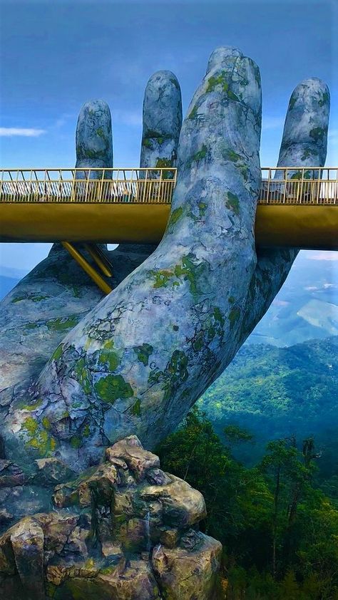 asiablog-universe Golden Bridge On Ba Na Hills, Vietnam Ever felt like you could do with a hand to cross a bridge? a bridge located above da nang’s ba na hills, in vietnam, has attracted a lot of attention for its two giant hands which seemingly lift the structure into the sky. Golden Bridge Vietnam, Cable Car Station, Ba Na Hills, Danang Vietnam, Da Nang Vietnam, Golden Bridge, Beautiful Vietnam, Car Station, Hills Resort