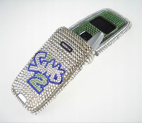 sims 2 bedazzled rhinestone nokia flip phone Bedazzled Flip Phone Y2k, Bedazzled Flip Phone, Nokia Flip Phone, Cow Print Cowboy Hat, Y2k Tech, Y2k Phone Case, Ophelia Dress, Armani Hotel, Hotline Bling