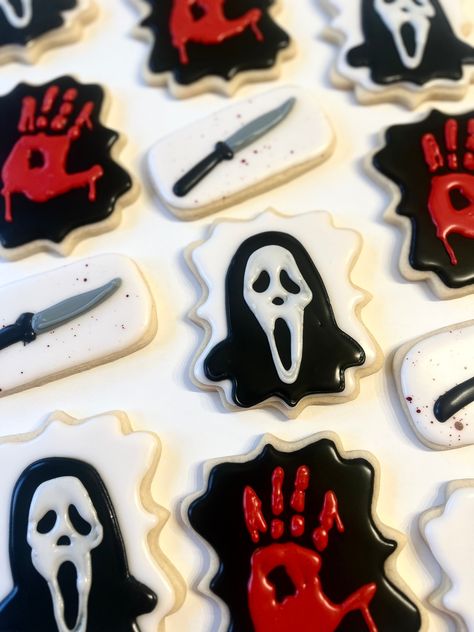 One dozen Scream  themed sugar cookies made to order. All cookies come individually heat sealed and wrapped in bubble wrap to make sure they arrive safely . Scream Movie Theme Cookies, Ghost Face Cookies Decorated, Horror Movie Sugar Cookies, Halloween Horror Cookies, Scary Halloween Cookies Decorated, Ghostface Cookies, Halloween Theme Cookies, Fall Decorated Cookies Royal Icing, Scream Themed Party