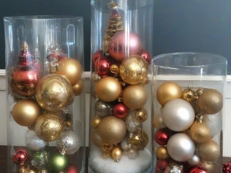 Hey everyone! It's that time of year again – Christmas is almost here, and it's the perfect opportunity to get creative with your last minute decorations. If you're looking for an easy way to spruce up your holiday decor in… Fairy Lights In Cylinder Vase, Christmas Ornaments In A Glass Vase, Christmas Bulbs In Vase, Christmas Tall Vase Decorations, Christmas Decor Glass Vase, Glass Vase Christmas Centerpiece, Holiday Vase Filler Ideas, Clear Vase Centerpiece, Tall Clear Vase Filler Ideas