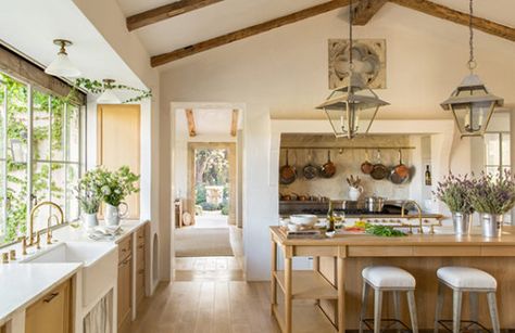 Inspired by French farmhouse kitchens and Belgian cabinetry, Brooke and Steve Giannetti designed a large, white oak center island for dining and prep work in their Ojai, California home. The stone quatrefoil and copper pots are both European antiques. Patina Farm, European Farmhouse, Farmhouse Inspiration, Provence Style, French Farmhouse, Large Kitchen, French Country Decorating, Küchen Design, Design Case