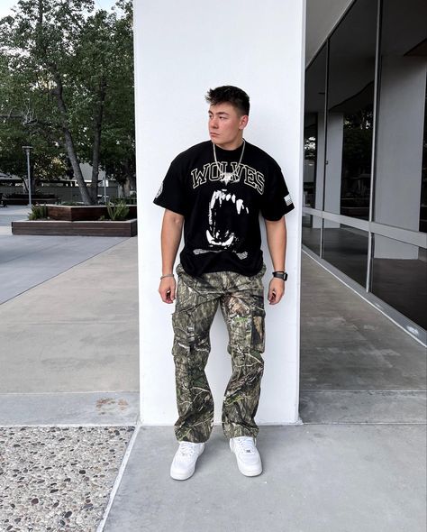 Camo cargos pants overaized graphic tee air force 1s. Camo Cargo Pants, Camo Pants, Cargo Pant, Black Tee, Black Pants, Air Force, Camo, Graphic Tees, Pants