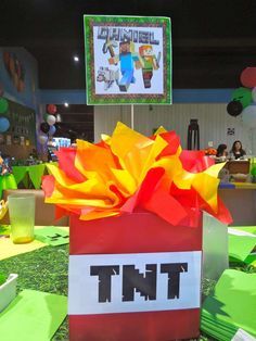 Birthday Party Minecraft Ideas, Tnt Birthday Party, Minecraft Birthday Party Centerpieces, Minecraft Party Table Decorations, Minecraft Birthday Centerpieces, Mindcraft Party Centerpieces, Minecraft Wrapping Ideas, Mind Craft Party Ideas, Minecraft Birthday Party Ideas Food