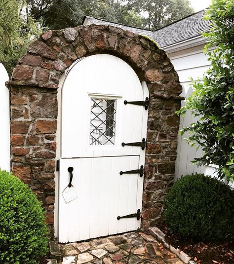 Dutch Door Design | COCOCOZY Dutch Door Garden Gate, Dutch Door Gate, Dutch Door Interior, Modern Gothic Home, Arched Gate, Dallas Garden, Painted Staircase, Garden Gate Ideas, Brick Arches