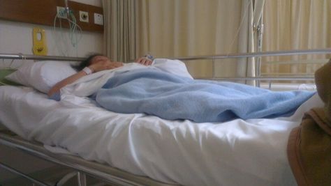 Sleeping restfully on a hospital bed. Person In Hospital Bed, Girl Hand With Drip In Hospital, Hospital Core, Hands With Drip In Hospital, In Hospital Bed, Hospital Admit, 49ers Pictures, Bed Picture, Hospital Admit Hand Pics