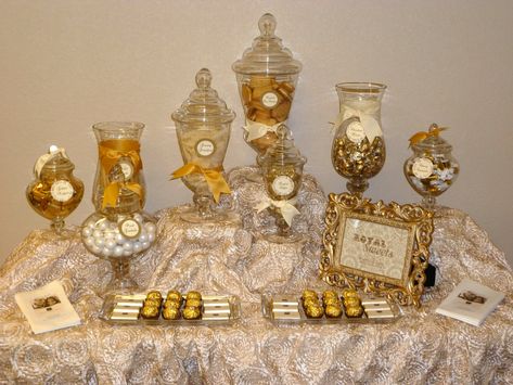 gold candy buffet | personalized chocolates and golden treats adorned the candy table Gold Candy Bar, Gold Candy Buffet, Bar A Bonbon, 50th Wedding Anniversary Party, Gold Candy, 50th Anniversary Party, Golden Wedding Anniversary, Golden Birthday, Custom Candy