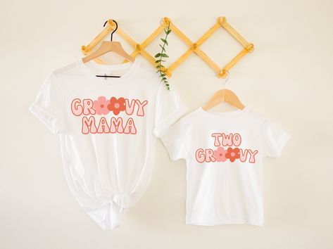 "This tee is for the \"Groovy Mama\" shirt. This mom t-shirt is perfect for a hippie birthday party! Link for \"Two Groovy\" toddler tee: https://www.etsy.com/listing/1197267384 Other family tees with this design- -groovy grandma- https://www.etsy.com/listing/1212200659 -groovy auntie- https://www.etsy.com/listing/1215507073 *HOW TO ORDER* 1. Look through photos at the different colors and the sizing chart (all shirts & sweatshirts are unisex!) 2. Select your size and color from the drop down me Groovy Birthday Party, Hippie Birthday Party, Party Link, Groovy Tees, Birthday Party Shirts, Groovy Mama, Toddler Girl Tees, Two Groovy, 2nd Birthday Party For Girl