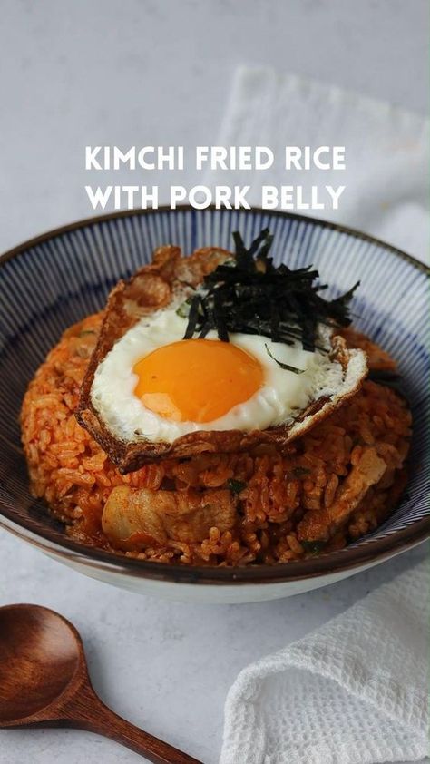 Pork Belly Kimchi Fried Rice. Savoury, tangy, spicy fried rice with scrumptious kimchi flavour paired with pork belly. Comes together in 30 minutes with warm cooked rice. Fantastic for dinner or lunch. Recipe link: https://christieathome.com/blog/pork-belly-kimchi-fried-rice/ #what to eat with kimchi #kimchee fried rice #korean cooking #kimchi recipe ideas dinners #korean recipes, #asianfood #asiancooking #koreanfood #koreancooking #koreanrecipes #kimchifriedrice #rice #kimchi bokkeumbap Kimchi Pork Fried Rice, Pork With Kimchi, Pork Belly Kimchi Fried Rice, Kimchi Fried Rice Korean, Kimchi Ideas Dinners, Kimchi Fried Rice With Pork Belly, How To Make Kimchi Fried Rice, Fried Kimchi Rice, Kimchi Pairings