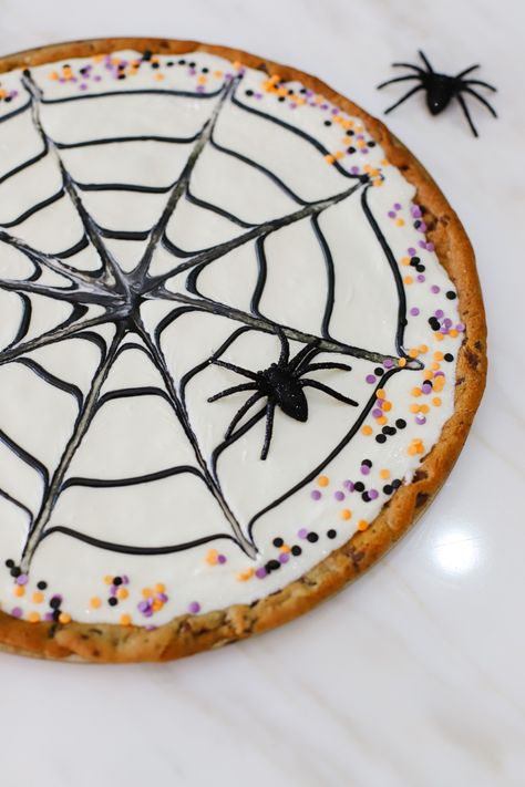 Halloween cookie pizza Halloween Cookie Pizza Ideas, Spider Web Cookie Pizza, Cookie Pizza Halloween, Spiderweb Cookie Cake, Giant Halloween Cookie, Spider Cookie Cake, Cookie Dough Pizza Recipe, Spider Web Cookie Cake, Halloween Cookie Pizza