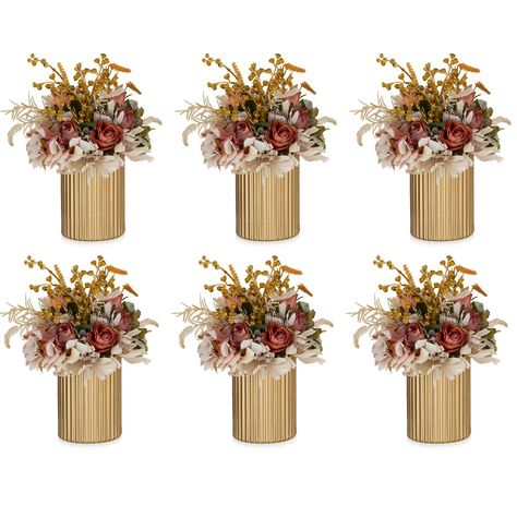 PRICES MAY VARY. Wedding Centerpieces Decoration: Nuptio flower pot set is the perfect centerpiece for both intimate and grand wedding or party tables. A contemporary twist on classic décor, mingling with your other elements to create a cohesive and stylish arrangement. They're not just small metal flowers vase; They're the stars of your event decor. Add a touch of modern elegance to your special day with Nuptio gold flower vase set. Minimalist Chic: With its clean lines, simple design, and eleg Modern Centerpieces For Party, Rustic Romantic Wedding Decor, Gold Floral Arrangements, Gold Flower Vase, Round Wedding Tables, Vases For Centerpieces, Wedding Vase Centerpieces, Centerpieces For Tables, Flowers Stand