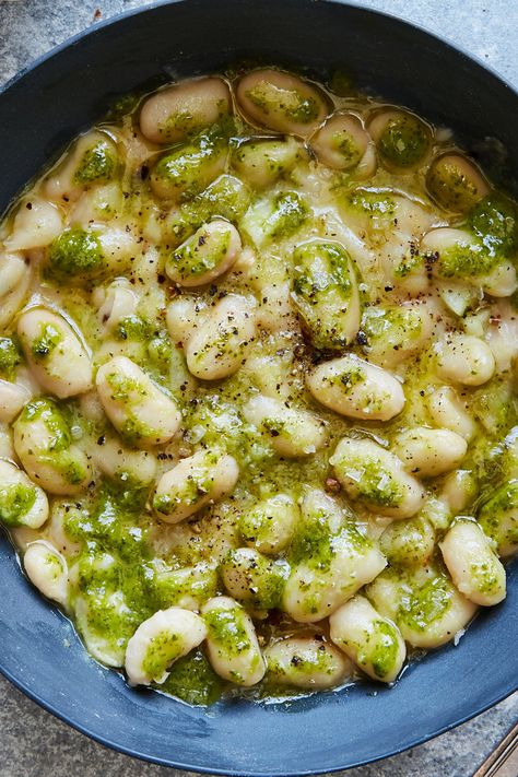 Creamy White Beans With Herb Oil Recipe - NYT Cooking Herb Oil Recipe, Creamy White Beans, Herb Oil, How To Cook Beans, Nyt Cooking, Butter Beans, Bean Recipes, White Beans, Vegetarian Dishes