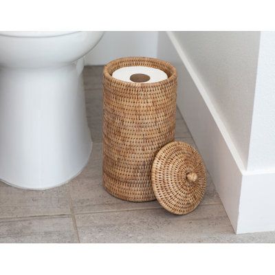 This toilet paper holder completes your coastal farmhouse bathroom makeover with a natural look. It's crafted from Burmese rattan in a wicker weave that reminds us of classic porch furniture. The design features a cylindrical shape and measures 1' high, perfectly crafted to hold rolls of toilet paper. We love that this toilet paper holder comes with a charming lid so it holds bathroom essentials but still looks elegant. Plus, it's water- and rust-resistant, so it holds up to everyday use. Finish Double Toilet Roll Holder, Paper Tower, Tissue Roll Holder, Free Standing Toilet Paper Holder, Roll Storage, Toilet Paper Roll Holder, Boho Bathroom, Toilet Roll Holder, Roll Holder