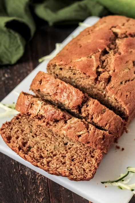 Classic, simple Zucchini Bread filled with shredded zucchini, cinnamon, and a hint of nutmeg. This bread can be made with all purpose flour or gluten-free all purpose flour, dairy-free or not, and has simple high altitude adjustments, making it the BEST Zucchini Bread recipe. This bread is also sweetened with applesauce and brown sugar, for a lighter version of the classic (and can also be made with just applesauce and maple syrup instead!). Extra Zucchini, Easy Zucchini Bread Recipes, Moist Bread, Vegan Zucchini Bread, Gluten Free Zucchini Bread, Easy Zucchini Bread, Best Zucchini Bread, Cherry Bread, Yummy Bread