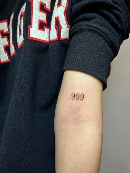 The 999 tattoos is a very popular tattoo design. There are many different types of 999 tattoos, but all of them involve three 9's in some way. The most common 999 Small Tattoo, Small 999 Tattoo, 999 Number Tattoo, Red 999 Tattoo, 999 Tattoo Number, 999 Tatoos, 999 Angel Number Tattoo Ideas, Number 9 Tattoo Ideas, 9 Tattoo Number