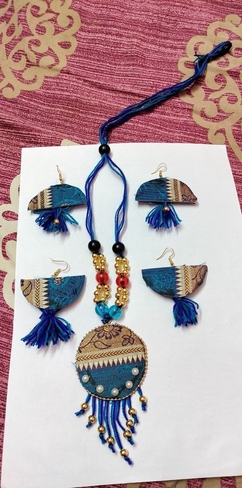 This fabric jewellery is made of waste cloth materials and cardboard boxes and I have added my fine touch to it. Jewellery From Waste Material, Waste Fabric Craft Ideas, Waste Clothing, Doodle Quotes, Jewellery Photography, Fabric Jewellery, Waste Material, School Creative, Upcycling Ideas