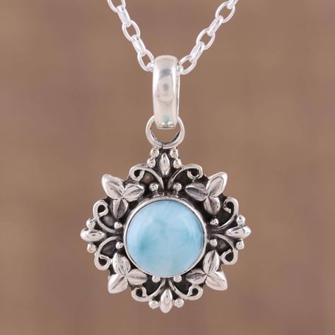 A beautiful stone of larimar glows with mystical wonder in this beautiful pendant necklace from designer Aparna. Handcrafted in India, the feminine necklace features a sterling silver frame adorned with leafy floral motifs that centers an oval cabochon of larimar. The artisan uses oxidization to enhance the intricate details on the pendant, accentuating its graceful allure. Curated Ears, Ethereal Jewelry, Feminine Necklace, Beautiful Pendant Necklace, Turquoise Pendant Necklace, Larimar Pendant, Sterling Silver Cross Pendant, Larimar Stone, Ornament Ideas