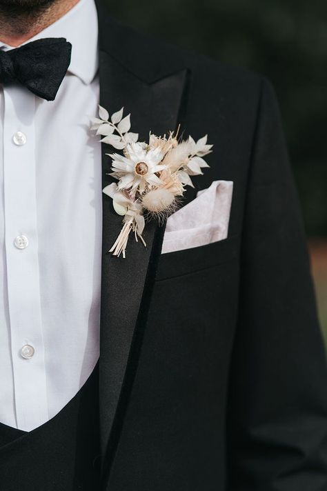 Groom in black tie with white dried flower buttonhole with bunny grass Boutonniere Ideas, Hampton Manor, Grass Centerpiece, White Pampas, Black Tie Dress Code, Pink Pampas Grass, Button Holes Wedding, Groomsmen Outfits, Groom Accessories