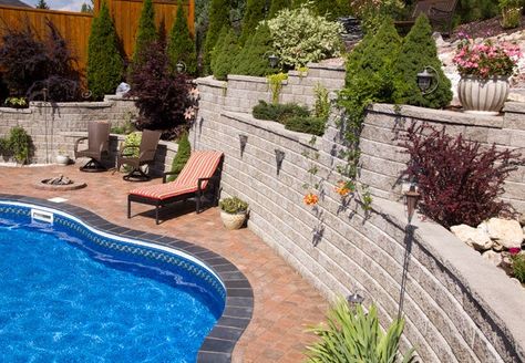 Backyard Retaining Wall Ideas, Backyard Retaining Wall, Hillside Backyard, Poolside Ideas, Hillside Pool, Retaining Wall Ideas, Decks Around Pools, Terraced Gardens, Backyard Retaining Walls