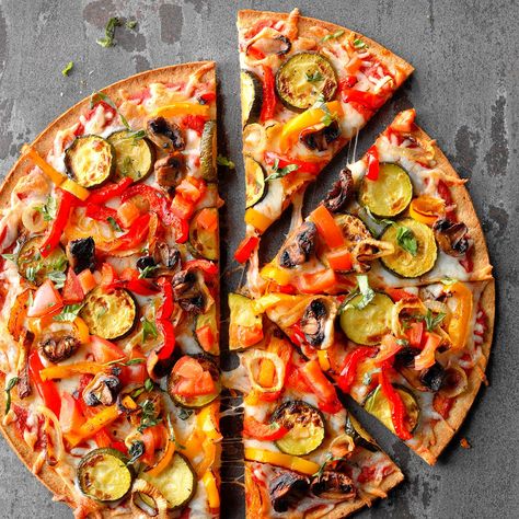 Grilled Veggie Pizza Recipe -I came up with this recipe one summer as a way to use up vegetables from our garden. Grilling the veggies first brings out their sizzling flavors. Try it with a sprinkling of olives or pine nuts before adding the cheese. —Susan Marshall, Colorado Springs, Colorado Veggie Pizza Recipe, Pizza Lasagna, Veggie Pizza, Grilled Pizza, Grilled Zucchini, Easy Summer Meals, Pizza Recipe, Recipes Vegetarian, Good Pizza