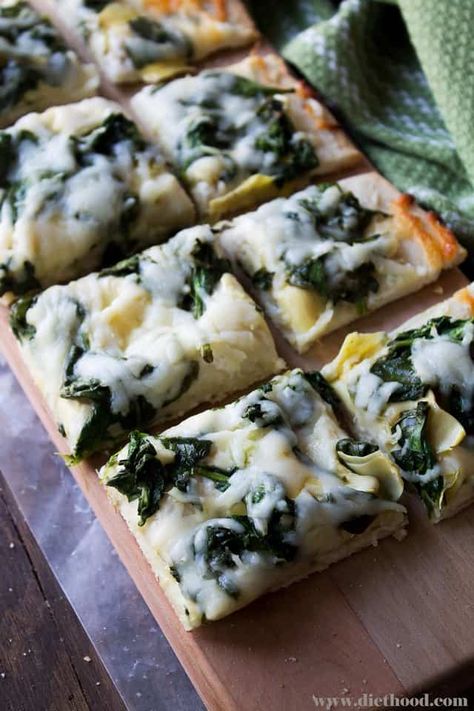 Spinach and Artichoke Dip Pizza | www.diethood.com | Homemade pizza crust topped with spinach, cream cheese, and artichokes | #recipe #pizza #dinner Pioneer Dinner Ideas, Dinner Ideas Pizza, Fun Rehearsal Dinner Ideas, Artichoke Dip Pizza, Rehearsal Dinner Ideas, Pizza Homemade, Homemade Pizza Crust, Spinach And Artichoke Dip, Game Day Party