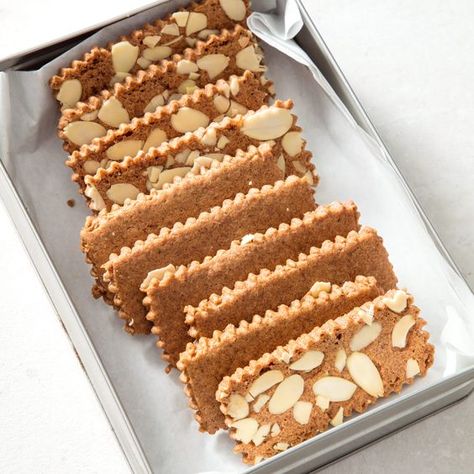 Passengers can’t get enough of Delta Air Lines’ in-flight snack of Biscoff, the commercial version of this Belgian confection. We took it to even greater heights. Bars Cookies, Speculoos Cookies, Donut Toppings, Cookie Toppings, America's Test Kitchen Recipes, Cooks Illustrated, America's Test Kitchen, Spice Cookies, Almond Cookies