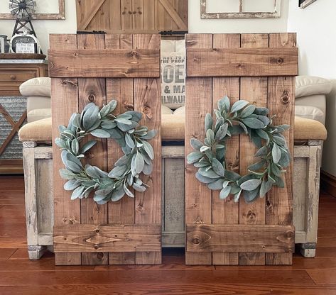 Add a touch of rustic farmhouse charm to your home with this Wood Shutter Wall Decor including a Lambs Ear Wreath. Measuring 14" x 30", this unique piece is perfect for adding a pop of greenery and texture to any space. Each shutter is handcrafted and no two are exactly alike, making it a truly one-of-a-kind addition to your decor. Whether you're looking to create a beach house vibe or simply want to add a touch of farmhouse style, this wall decor is sure to impress.  Hanging hardware is include Window With Shutters Wall Decor, Diy Farmhouse Window Frame, Wreaths For Bedroom Wall Decor, Shutter Ideas For Inside, Bedroom Wall Decor Rustic, Old Shutter Ideas Home Decor, Diy Shutters Indoor Wall Decor, Diy Shutters Indoor, Farmhouse Shutters Decor