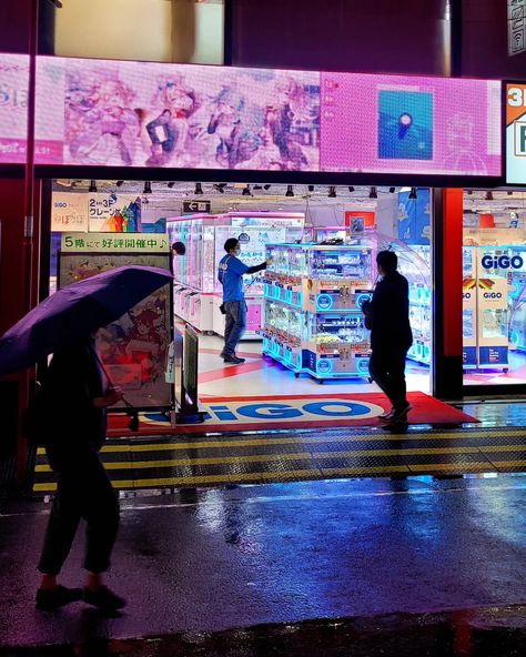 Have you visited Akihabara in the rain at night yet? Akihabara, aka Akiba, is the anime otaku district of Tokyo Japan. The neon lights and anime billboards always look the best on a rainy night. Most of the anime figure stores are closed at night, but the arcades, games centers, and maid cafes are still open. It's also a great time to try to spot some itasha Tokyo Karaoke, Rain At Night, Rainy Night, Night Market, Neon Lights, Anime Figures, Tokyo Japan, In The Rain, Cinematography