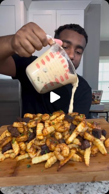 🧬Helping You Unlock the Best Version of Yourself on Instagram: "Loaded Surf & Turf Fries! 🍤🥩 
.
. credit goes to ⤵️
🎥 : @eatwitzo 
.
.

I was thinking of new appetizers I wanted to try and this is now my new favorite! Make it immediately 😂

Full ingredient list: 

1-2 lb steak cubed (ny strip or sirloin) 
1 lb large shrimp 
1-2 tsp chili powder
1-2 tsp dried oregano 
1-2 tsp onion powder 
1-2 tsp black pepper
1-2 tsp salt (optional) 
*Use separate seasoning amount for steak & shrimp* 
For fries: 
6-8 large russet potatoes peeled 
Large ice water bath 
Directions- 
1. Cut fries and add to water bath to soak for At least 30 minutes (to remove all starch) 
2. Pat fries dry and bring oil to 300 F and fry for 5-6 minutes until fully cooked. 
3. Set aside and bring oil to 375 F. Fry for ano Steak Loaded Fries, Loaded Steak Fries, New Appetizers, Steak And Fries, Steak Shrimp, Steak And Shrimp, Loaded Fries, Surf Turf, Ny Strip