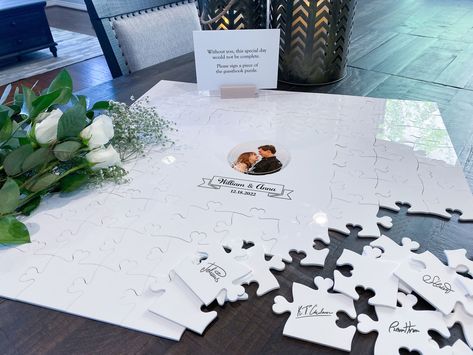 "Our wedding guest book puzzles are a fun alternative to traditional guest books. They're made of 1/8\" thick glossy white acrylic for a sturdy feel while still being lightweight. Each piece is 2.5\"x2.5\" and glossy on both sides. Use any alcohol based permanent pens or markers for signing the pieces. Each piece is precisely LASER cut for smooth edges and precise fit.  The center piece is personalized with a photo and the couple's names and wedding date. We use a process called UV printing that Puzzle Guest Book Wedding, Guest Book Unique, Puzzle Wedding, Acrylic Puzzle, Puzzle Guest Book, Personalized Playing Cards, Wedding Puzzle, Floral Circle, Unique Guest Book