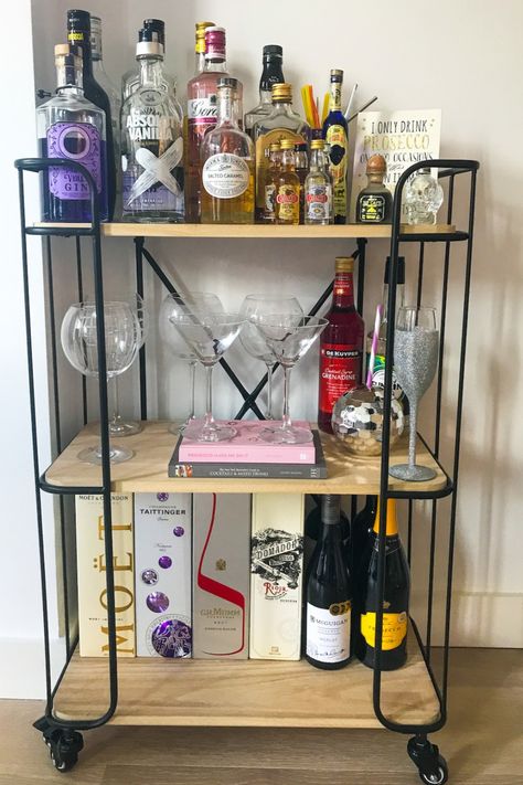 Check out how we styled a bar cart on a budget. Including bar cart ideas and bar cart styling. Bar Trolley Styling, Swanky Bar, Trolley Ideas, Decorate Cubicle At Work, Space Saving Ideas For Home, Bar Cart Ideas, Cocktail Trolley, Home Bar Rooms, Cart Ideas