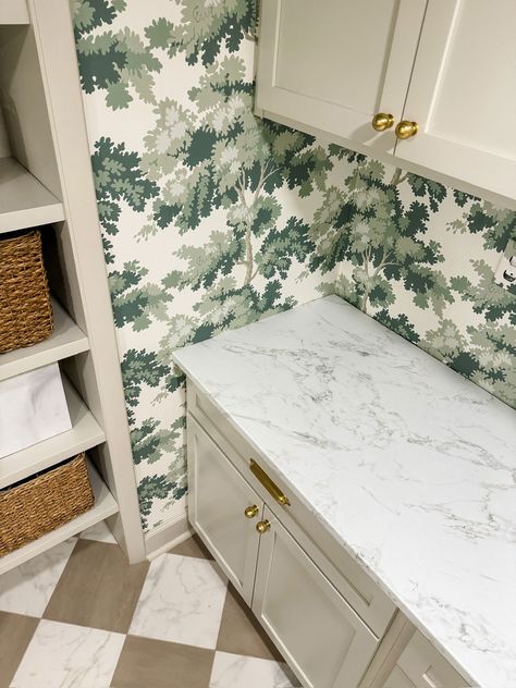 faux marble countertops and check floor for laundry room design Wallpaper Behind Shelves Laundry Room, Laundry Room Countertop Options, Marble Laundry Room, Wallpaper Countertop, Faux Marble Countertops, Check Floor, Laundry Room Counter, Laundry Room Countertop, Tiny Laundry Rooms