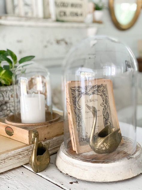 Simple Vignette Ideas to Refresh Your Space Robyn Core, Styling Books, Cloche Ideas, Farmhouse Simple, Glass Cloches, Old Pages, Cozy White Cottage, Jars Decor, Make A Garland